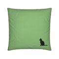 A square sage green throw pillow featuring a small black silhouette of a sitting cat in the bottom right corner, set against a plain white background.