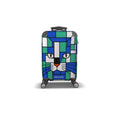 A hard-shell kids toll on spinner suitcase with a colorful geometric cat-face design in shades of blue, green, white, and gray, featuring the brand name 'skismic' on the front, set against a plain white background.