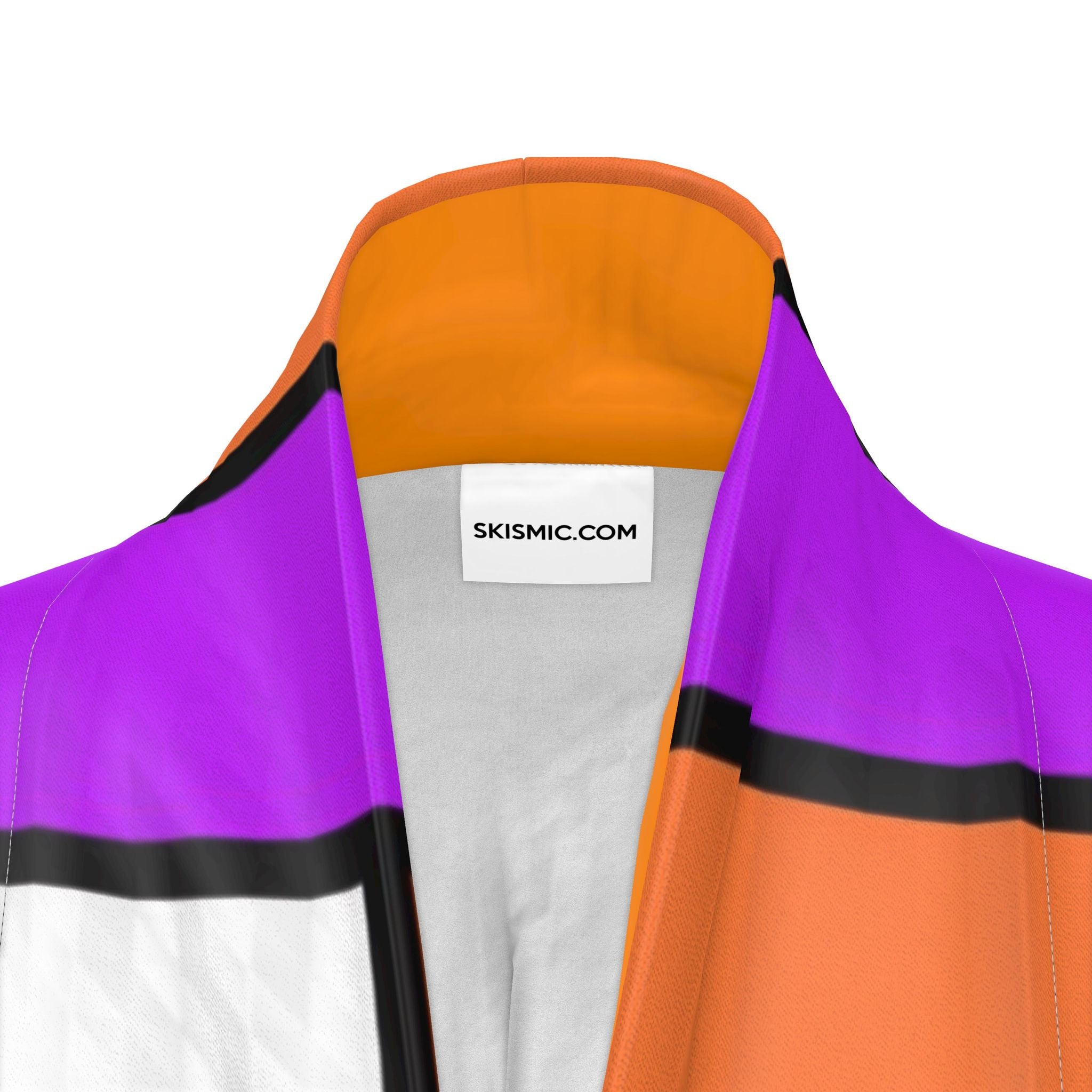 Close-up of a track kimono collar showing a color-blocked design with purple, orange, white, and black panels, featuring a white neck label with the text 'SKISMIC.COM'.