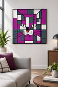 A framed geometric cat art print hangs on a white wall above a light beige sofa in a modern living room. The print features a stylized cat face made of purple, magenta, white, and dark gray blocks.