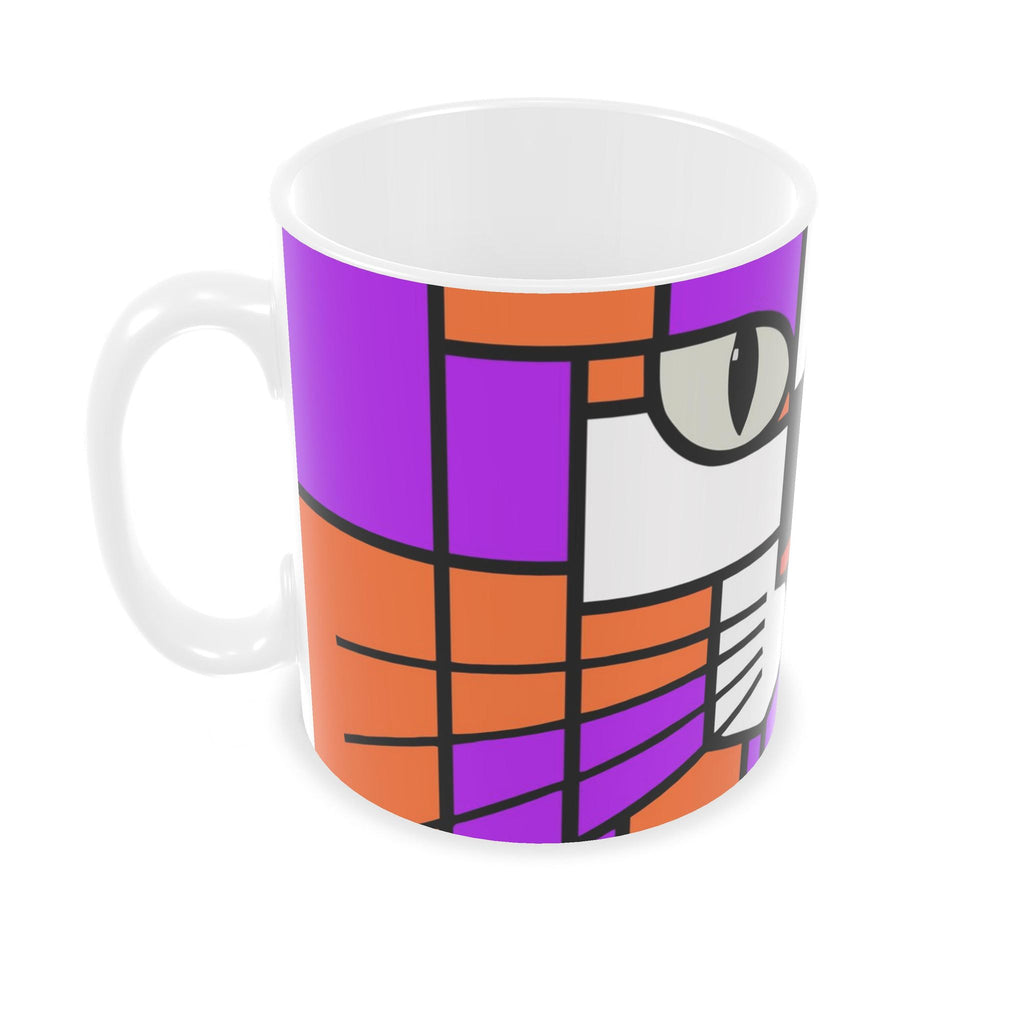A ceramic mug featuring a colorful geometric cat face design in purple, orange, and white with black outlines, shown on a plain white background.